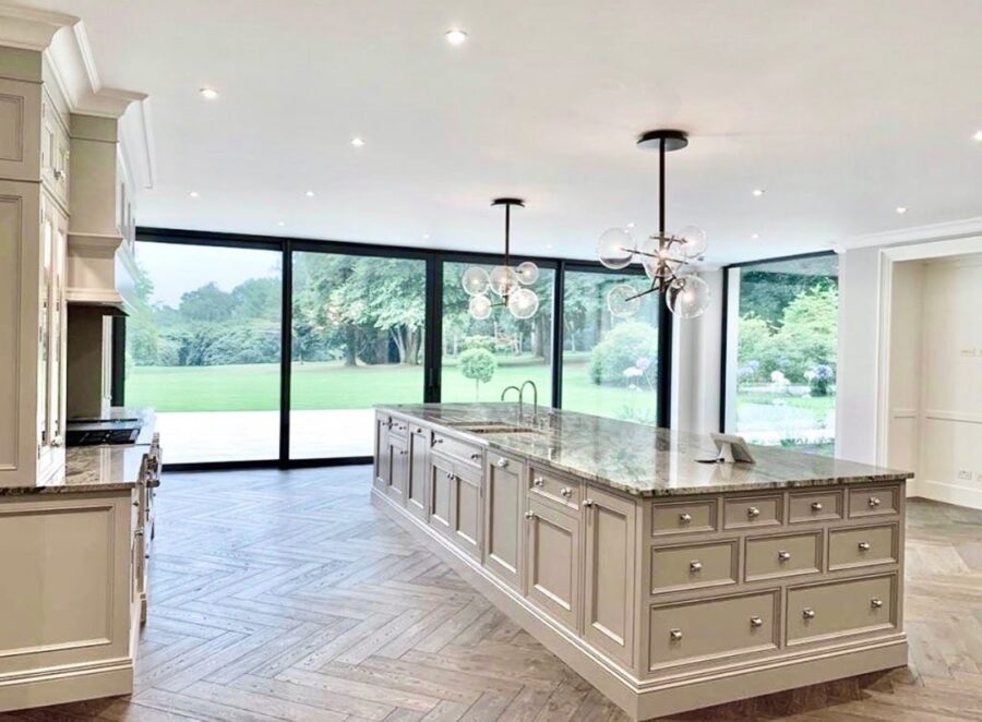 Kinawa White granite kitchen island by Landford Stone, Wiltshire.