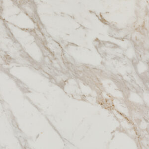 White marble surface with light brown and beige natural veining patterns.
