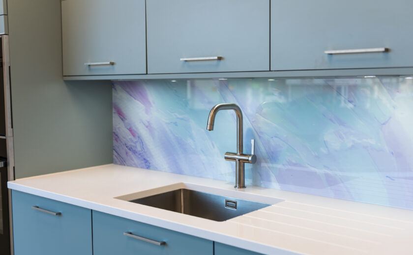 Modern Blue Kitchen with white countertops