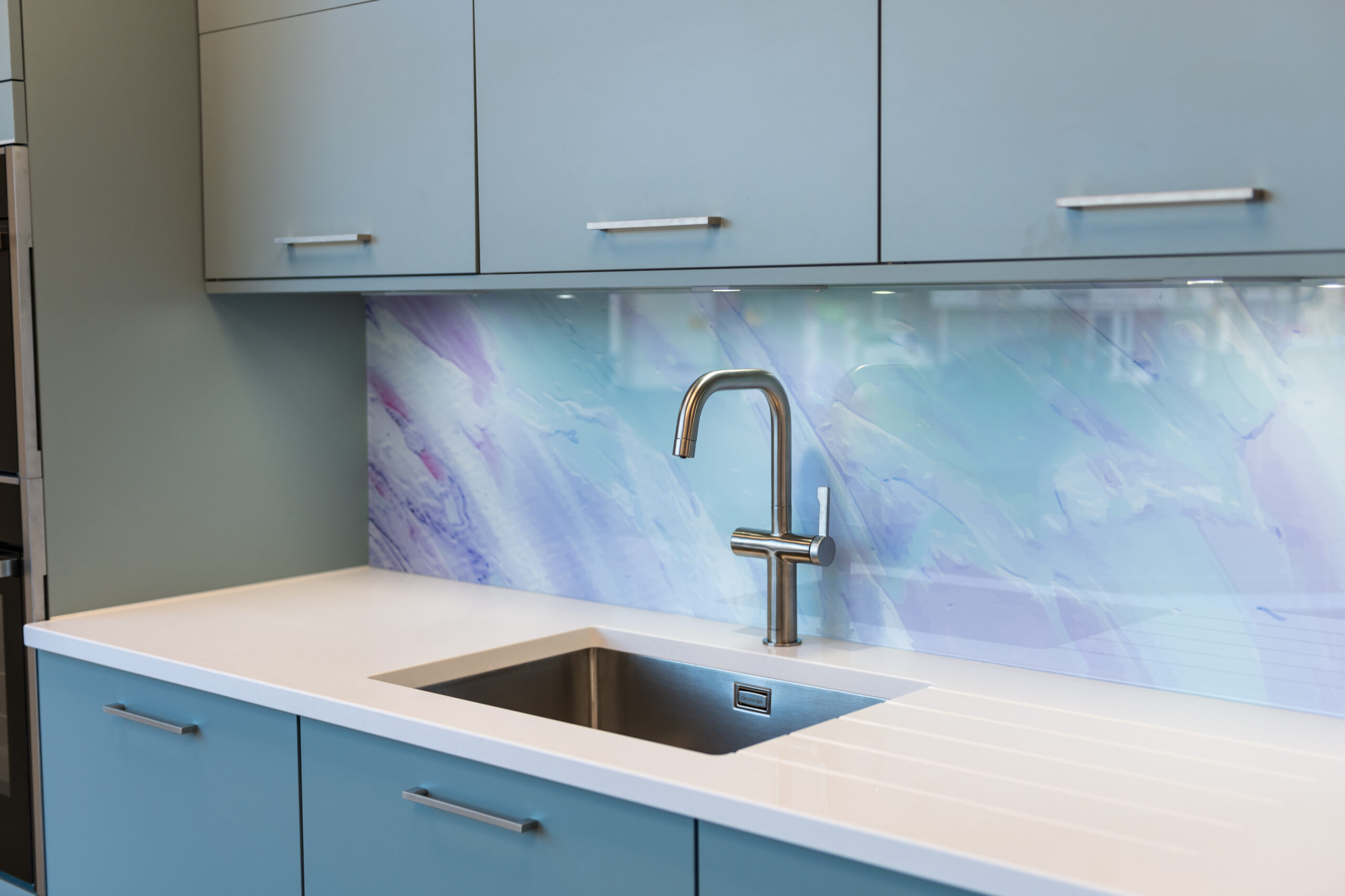 Modern Blue Kitchen with white countertops