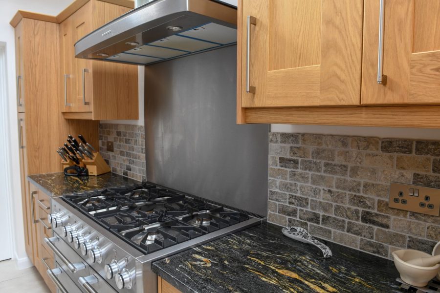 Black Cosmic Granite Kitchen. Installed by Meridian Interiors. Supplied by Landford Stone, UK.