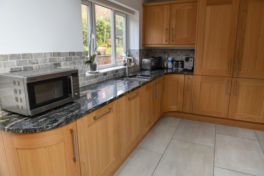 Black Cosmic Granite Kitchen. Installed by Meridian Interiors. Supplied by Landford Stone, UK.