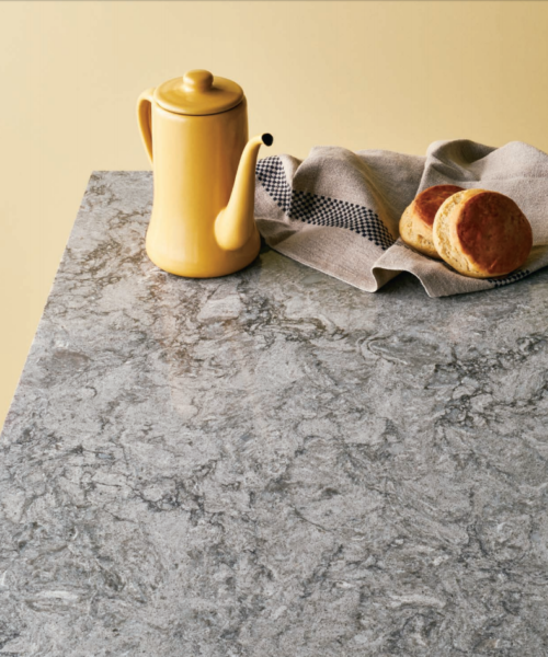 Landford Stone caesarstone turbine grey quartz worktop with tea pot and towel on top