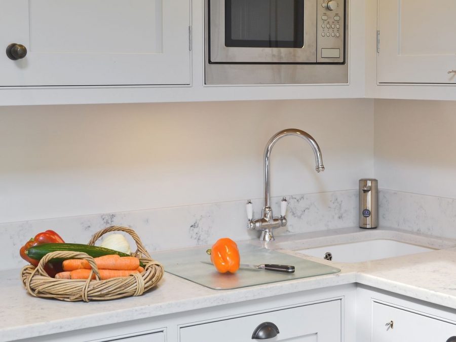 Teltos Carrara Onyx Kitchen. Landford Stone, Wiltshire.