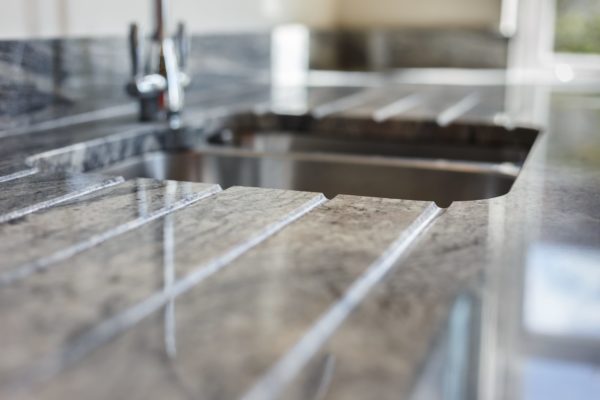 Kinawa White Granite kitchen sink. BH Kitchens and Landford Stone, UK.