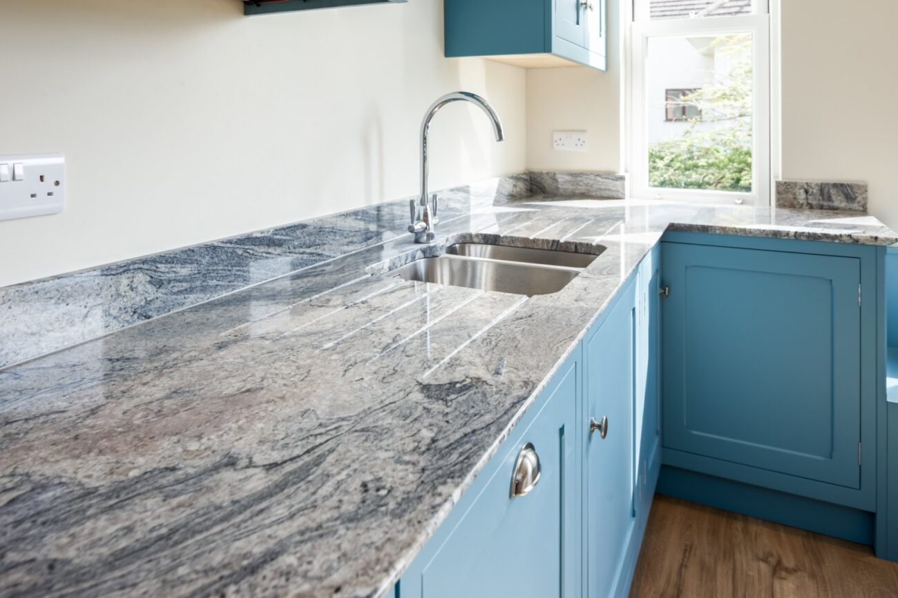 KINAWA WHITE GRANITE KITCHEN